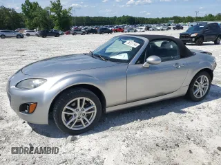 2011 Mazda MX-5 Miata Sport z VIN JM1NC2JF7B0213946, wystawiony jako Copart lot #55231194 z przebiegiem 159 331 mil mil oraz Szkoda całkowita • Salvage title. Historia ofert i sprzedaży dostępna na DreamBid. Obrazek 1.