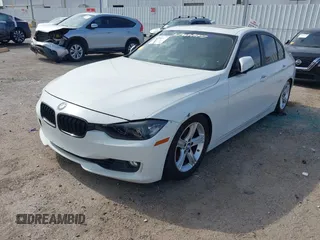 2012 BMW 3 Series 328i with VIN WBA3A5C53CF341664, listed as a IAAI auction lot 41991169 with 168,808 mi miles and . Bid and sale history available at carsss.com. Image 2.