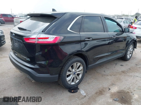 2019 Ford Edge Titanium z VIN 2FMPK3K91KBB95867, wystawiony jako IAAI lot #41798923 z przebiegiem 39 942 mil mil oraz . Historia ofert i sprzedaży dostępna na DreamBid. Obrazek 4.