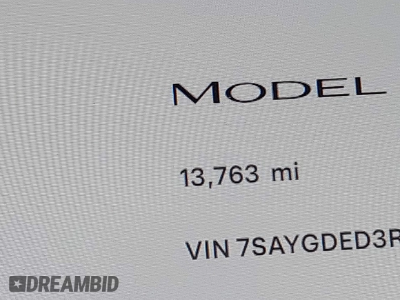2024 Tesla Model Y with VIN 7SAYGDED3RF019063, listed as a IAAI auction lot 42061888 with 13,763 mi miles and . Bid and sale history available at DreamBid. Image 14.