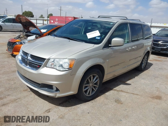 2014 Dodge Grand Caravan SXT with VIN 2C4RDGCG6ER466459, listed as a IAAI auction lot 41820907 with 105,404 mi miles and . Bid and sale history available at DreamBid. Image 2.