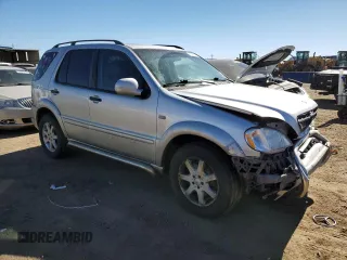 2000 Mercedes-Benz M 320/430/500 with VIN 4JGAB72E3YA172993, listed as a Copart auction lot 47051815 with 112,355 mi miles and Salvage title. Bid and sale history available at DreamBid. Image 4.