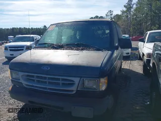 1999 Ford Econoline Cargo with VIN 1FTRE1422XHA33460, listed as a IAAI auction lot 41326443 with 119,294 mi miles. Bid and sale history available at carsss.com. Image 2.