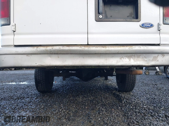 1996 Ford Econoline Cargo with VIN 1FTJS34H4THA69893, listed as a IAAI auction lot 41703257 with 206,503 mi miles and . Bid and sale history available at DreamBid. Image 6.