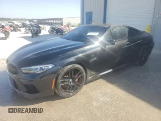 2022 BMW M8 Competition with VIN WBSAE0C01NCK03799, listed as a Copart auction lot 71018384 with 22,043 mi miles and Salvage Title. Bid and sale history available at carsss.com. Image 1.