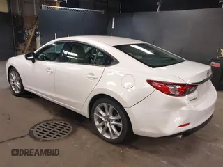 2014 Mazda Mazda6 i Touring with VIN JM1GJ1V68E1147067, listed as a IAAI auction lot 42105878 with 102,684 mi miles. Bid and sale history available at carsss.com. Image 3.