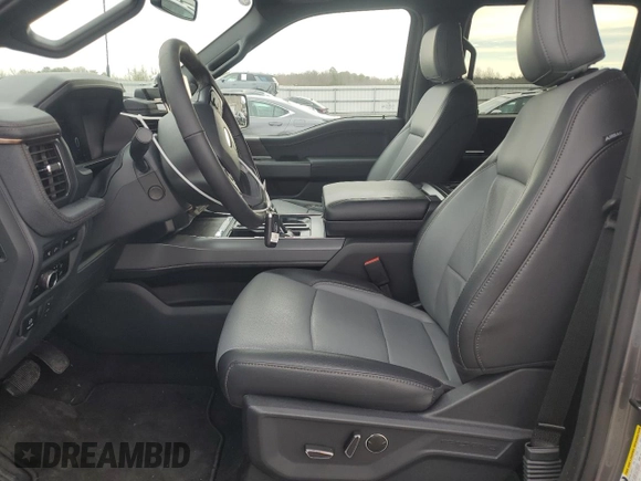 2024 Ford F-150 Lightning Lariat with VIN 1FT6W5L79RWG19060, listed as a Copart auction lot 43415085 with 2,733 mi miles and Salvage title. Bid and sale history available at DreamBid. Image 7.