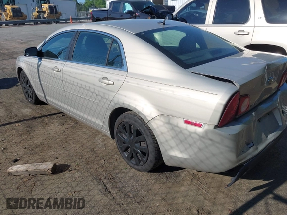 2011 Chevrolet Malibu 1LS with VIN 1G1ZB5E13BF151522, listed as a IAAI auction lot 42030247 with 130,129 mi miles and . Bid and sale history available at DreamBid. Image 3.