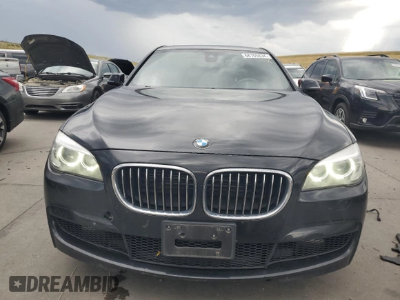 2014 BMW 7 Series 750i xDrive with VIN WBAYB6C56ED224880, listed as a Copart auction lot 72554084 with 115,146 mi miles and Salvage Title. Bid and sale history available at carsss.com. Image 5.