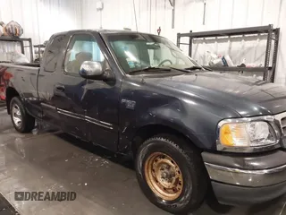 2001 Ford F-150 XL z VIN 1FTRX17L61NB44147, wystawiony jako IAAI lot #41464804 z przebiegiem 130 860 mil mil oraz . Historia ofert i sprzedaży dostępna na DreamBid. Obrazek 6.