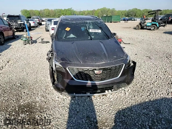2021 Cadillac XT4 FWD Premium Luxury z VIN 1GYFZCR45MF002654, wystawiony jako Copart lot #52288105 z przebiegiem Nie podano mil oraz Szkody całkowita. Historia ofert i sprzedaży dostępna na DreamBid. Obrazek 12.