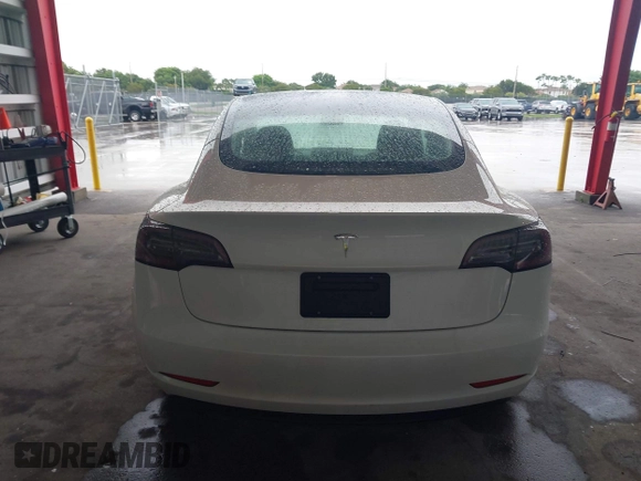 2023 Tesla Model 3 with VIN 5YJ3E1EA9PF548726, listed as a IAAI auction lot 42345157 with 30,647 mi miles and . Bid and sale history available at DreamBid. Image 17.