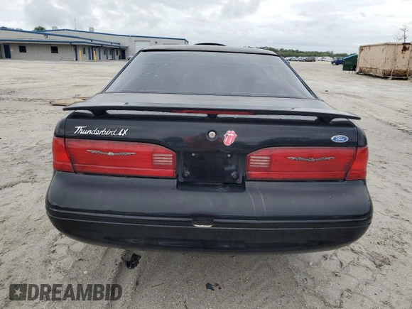 1997 Ford Thunderbird LX z VIN 1FALP62W7VH165149, wystawiony jako Copart lot #56654715 z przebiegiem 155 190 mil mil oraz Szkody całkowita. Historia ofert i sprzedaży dostępna na DreamBid. Obrazek 6.