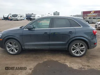 2015 Audi Q3 Prestige with VIN WA1GFCFS5FR009590, listed as a IAAI auction lot 41694903 with 164,193 mi miles and . Bid and sale history available at DreamBid. Image 14.