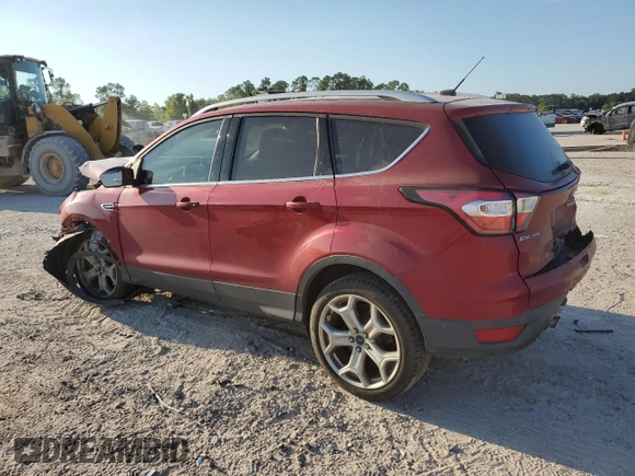 2017 Ford Escape Titanium with VIN 1FMCU0J97HUD52930, listed as a Copart auction lot 71851014 with 101,467 mi miles and Salvage Title. Bid and sale history available at carsss.com. Image 2.
