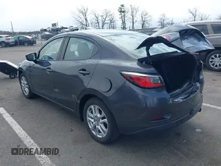2018 Toyota Yaris with VIN 3MYDLBYV2JY321213, listed as a IAAI auction lot 41890815 with 94,089 mi miles and . Bid and sale history available at DreamBid. Image 3.