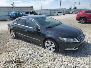 2013 Volkswagen CC Sport Plus z VIN WVWBP7AN1DE541221, wystawiony jako Copart lot #57398645 z przebiegiem 133 505 mil mil oraz Szkoda całkowita • Salvage title. Historia ofert i sprzedaży dostępna na DreamBid. Obrazek 4.
