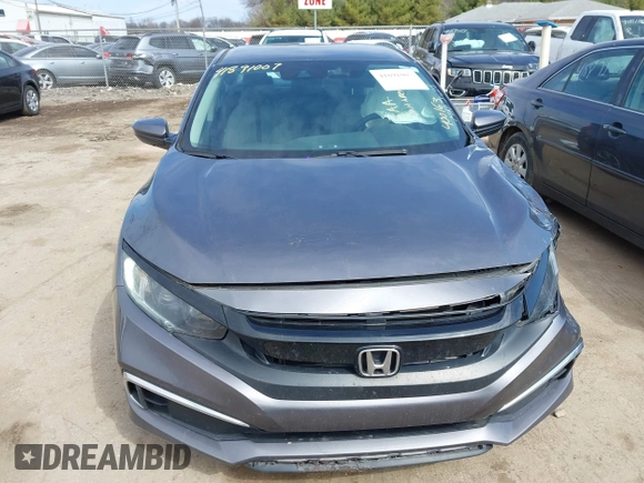 2019 Honda Civic LX with VIN 19XFC2F61KE037495, listed as a IAAI auction lot 41891007 with 90,262 mi miles and . Bid and sale history available at DreamBid. Image 12.