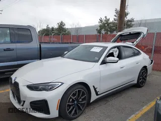 2023 BMW i4 eDrive40 z VIN WBY73AW05PFR28279, wystawiony jako IAAI lot #41262952 z przebiegiem 40 011 mil mil oraz . Historia ofert i sprzedaży dostępna na DreamBid. Obrazek 2.