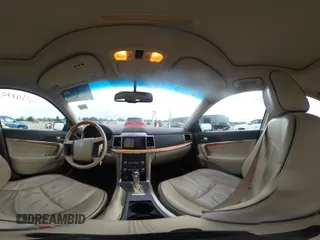 2010 Lincoln MKZ z VIN 3LNHL2GC2AR636552, wystawiony jako IAAI lot #42330172 z przebiegiem 98 883 mil mil oraz . Historia ofert i sprzedaży dostępna na DreamBid. Obrazek 22.