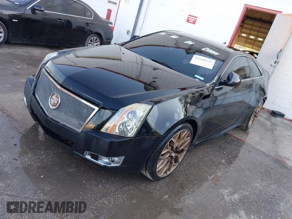 2011 Cadillac CTS Performance z VIN 1G6DJ1ED7B0135191, wystawiony jako IAAI lot #41660128 z przebiegiem 121 567 mil mil oraz . Historia ofert i sprzedaży dostępna na DreamBid. Obrazek 2.