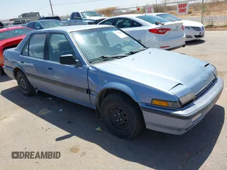 1989 Honda Accord z VIN JHMCA5634KC063370, wystawiony jako IAAI lot #41949800 z przebiegiem 178 883 mil mil oraz . Historia ofert i sprzedaży dostępna na DreamBid. Obrazek 1.