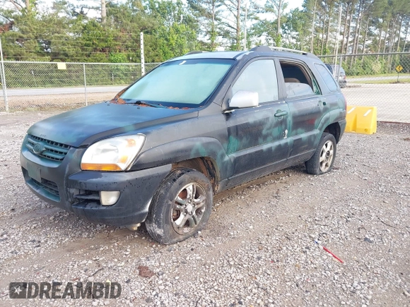 2006 Kia Sportage LX with VIN KNDJF723467183437, listed as a IAAI auction lot 42193429 with 186,114 mi miles and . Bid and sale history available at carsss.com. Image 2.