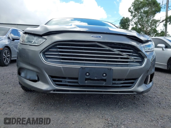 2013 Ford Fusion SE Hybrid z VIN 3FA6P0LUXDR181849, wystawiony jako IAAI lot #41949276 z przebiegiem 112 688 mil mil oraz . Historia ofert i sprzedaży dostępna na DreamBid. Obrazek 6.