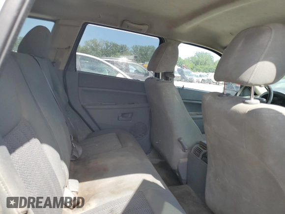 2006 Jeep Grand Cherokee Laredo с VIN 1J4GS48K16C300511, выставлен на аукционе Copart как лот 62196345 с пробегом 240 906 миль миль и Списание • Salvage title. История ставок и продаж доступна на DreamBid. Изображение 11.