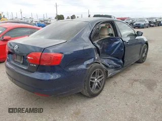 2012 Volkswagen Jetta SE with VIN 3VWDX7AJ3CM394606, listed as a IAAI auction lot 41938597 with 179,316 mi miles and . Bid and sale history available at DreamBid. Image 4.