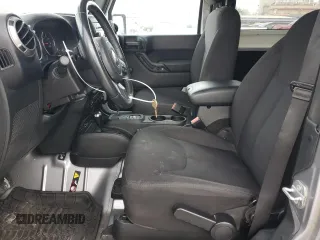 2015 Jeep Wrangler Sport with VIN 1C4AJWAG3FL560599, listed as a Copart auction lot 51850005 with 52,691 mi miles and Clean Title. Bid and sale history available at carsss.com. Image 7.