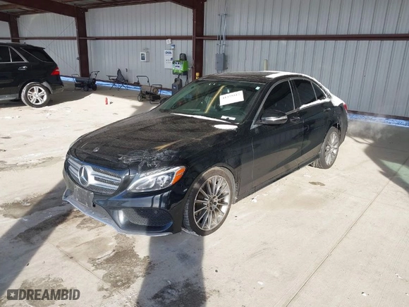 2018 Mercedes-Benz C-Class C 300 with VIN 55SWF4JB7JU279285, listed as a IAAI auction lot 41375517 with 132,484 mi miles. Bid and sale history available at carsss.com. Image 2.