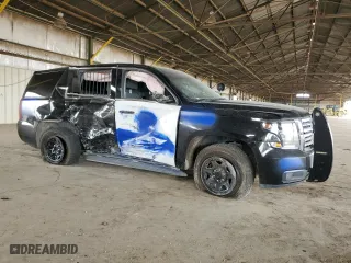 2020 Chevrolet Tahoe Commercial with VIN 1GNSKDEC0LR261827, listed as a Copart auction lot 84864374 with 0 mi miles and Salvage Title. Bid and sale history available at carsss.com. Image 4.