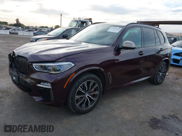 2021 BMW X5 M50i with VIN 5UXJU4C04M9G03418, listed as a IAAI auction lot 40705167 with 24,073 mi miles and . Bid and sale history available at DreamBid. Image 2.