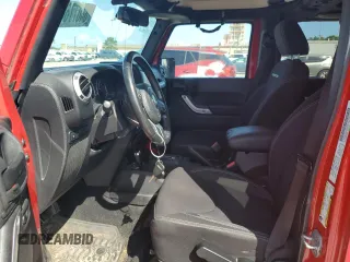 2014 Jeep Wrangler Unlimited Rubicon with VIN 1C4HJWFG5EL162736, listed as a Copart auction lot 64077645 with 126,330 mi miles and Salvage title. Bid and sale history available at DreamBid. Image 7.