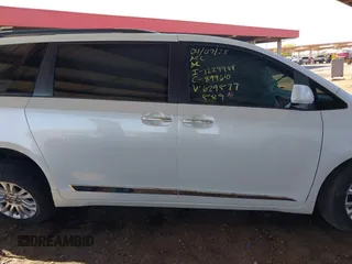 2015 Toyota Sienna XLE with VIN 5TDYK3DC8FS629577, listed as a IAAI auction lot 42019641 with 173,259 mi miles. Bid and sale history available at carsss.com. Image 13.