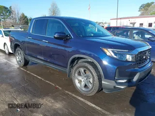 2021 Honda Ridgeline RTL-E with VIN 5FPYK3F73MB023208, listed as a IAAI auction lot 41806911 with 25,451 mi miles and . Bid and sale history available at DreamBid. Image 1.