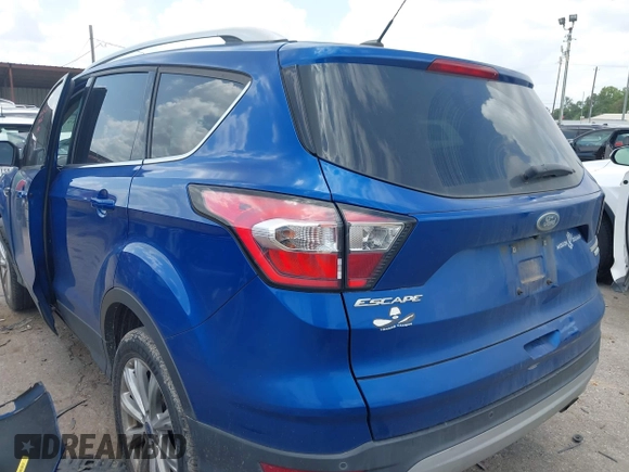 2017 Ford Escape Titanium with VIN 1FMCU0JD3HUE35131, listed as a IAAI auction lot 42062019 with 108,470 mi miles and . Bid and sale history available at DreamBid. Image 3.
