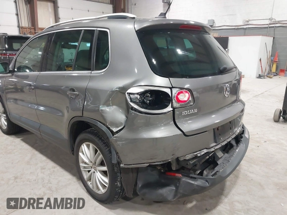 2011 Volkswagen Tiguan SE with VIN WVGBV7AX9BW524807, listed as a IAAI auction lot 41921439 with 204,813 mi miles and . Bid and sale history available at DreamBid. Image 6.