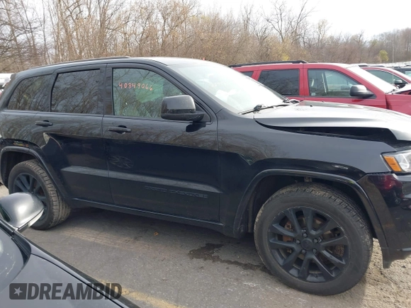 2017 Jeep Grand Cherokee Laredo with VIN 1C4RJFAG7HC873211, listed as a IAAI auction lot 40849066 with 139,430 mi miles. Bid and sale history available at carsss.com. Image 13.