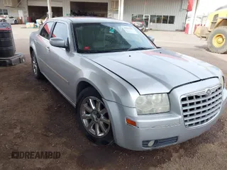 2007 Chrysler 300 Limited with VIN 2C3KA53G27H862495, listed as a IAAI auction lot 41891653 with 214,395 mi miles. Bid and sale history available at carsss.com. Image 1.