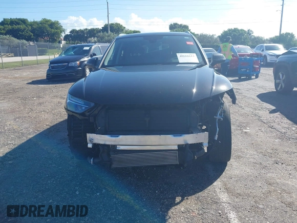 2023 Audi Q5 S line Premium Plus z VIN WA1EAAFY5P2128250, wystawiony jako IAAI lot #40666613 z przebiegiem 27 940 mil mil oraz . Historia ofert i sprzedaży dostępna na DreamBid. Obrazek 6.