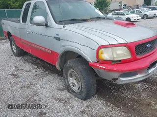 1997 Ford F-150 XL with VIN 1FTDX1869VNA33231, listed as a IAAI auction lot 42697823 with 149,986 mi miles and . Bid and sale history available at DreamBid. Image 6.
