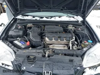 2001 Honda Civic LX with VIN 1HGEM21561L096010, listed as a IAAI auction lot 41300225 with 156,293 mi miles. Bid and sale history available at carsss.com. Image 10.
