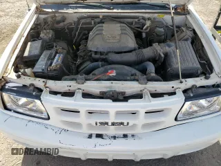 2000 Isuzu Rodeo S z VIN 4S2CK58W2Y4317915, wystawiony jako Copart lot #81780094 z przebiegiem 158 217 mil mil oraz Szkoda całkowita • Salvage title. Historia ofert i sprzedaży dostępna na DreamBid. Obrazek 12.