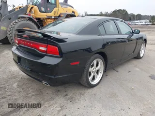 2013 Dodge Charger SXT with VIN 2C3CDXHG2DH525370, listed as a IAAI auction lot 41395980 with 226,079 mi miles. Bid and sale history available at carsss.com. Image 4.