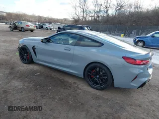 2024 BMW M8 with VIN WBSAE0C0XRCN42700, listed as a IAAI auction lot 41239212 with 7,732 mi miles. Bid and sale history available at carsss.com. Image 3.