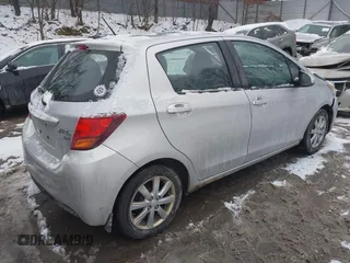 2015 Toyota Yaris L with VIN VNKKTUD32FA017551, listed as a IAAI auction lot 41267892 with 122,506 mi miles. Bid and sale history available at carsss.com. Image 4.