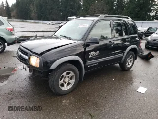 2003 Chevrolet Tracker ZR2 z VIN 2CNBJ734736946410, wystawiony jako Copart lot #82210474 z przebiegiem 61 414 mil mil oraz Szkoda całkowita • Salvage title. Historia ofert i sprzedaży dostępna na DreamBid. Obrazek 1.