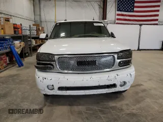 2005 GMC Sierra Denali z VIN 2GTEK63N851345265, wystawiony jako Copart lot #54933125 z przebiegiem 276 871 mil mil oraz Nie do naprawy. Historia ofert i sprzedaży dostępna na DreamBid. Obrazek 5.